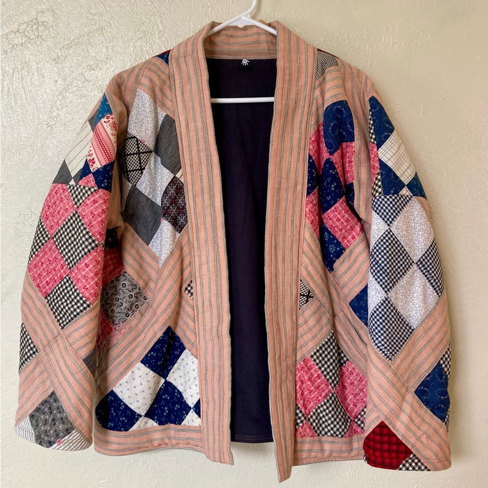 Handmade quilt coat from vintage quilt top